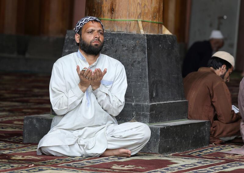 Kashmiri Muslims offer prayers and recite the Quran on the first day of fasting month of Ramadan inside Jamia Masjid (Kashmir's Grand Mosque) in Srinagar,the summer capital of Indian Kashmi.  EPA