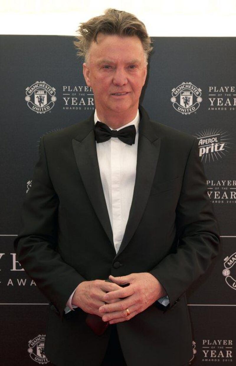 Manchester United manager Louis van Gaal poses for pictures on the red carpet as he arrives to attend the Manchester United club awards ceremony on Tuesday. Oli Scarff / AFP / May 19, 2015