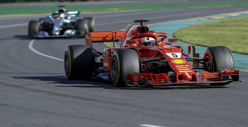 epa06628643 German driver Sebastian Vettel of Ferrari  leads British driver Lewis Hamilton of Mercedes during the 2018 Formula One Grand Prix of Australia at the Albert Park circuit in Melbourne, Australia, 25 March 2018.  EPA/DAVE ACREE ONLY AUSTRALIA AND NEW ZEALAND OUT