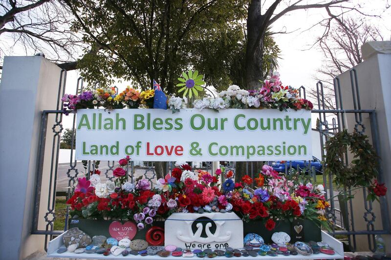 CHRISTCHURCH, NEW ZEALAND - AUGUST 22: Messages of love and compassion remain surrounded by flowers at the entrance to the Al Noor Mosque on August 22, 2019 in Christchurch, New Zealand. 51 people were killed and dozens were injured following the worst mass shooting in New Zealandâ€™s history after a man opened fire at Al Noor Mosque and the Linwood Islamic Centre in Christchurch on 15 March 2019. The Australian gunman is now facing 51 charges of murder and 40 of attempted murder as well as engaging in a Terrorist Act and is due to go on trial in May 2020. (Photo by Lisa Maree Williams/Getty Images)