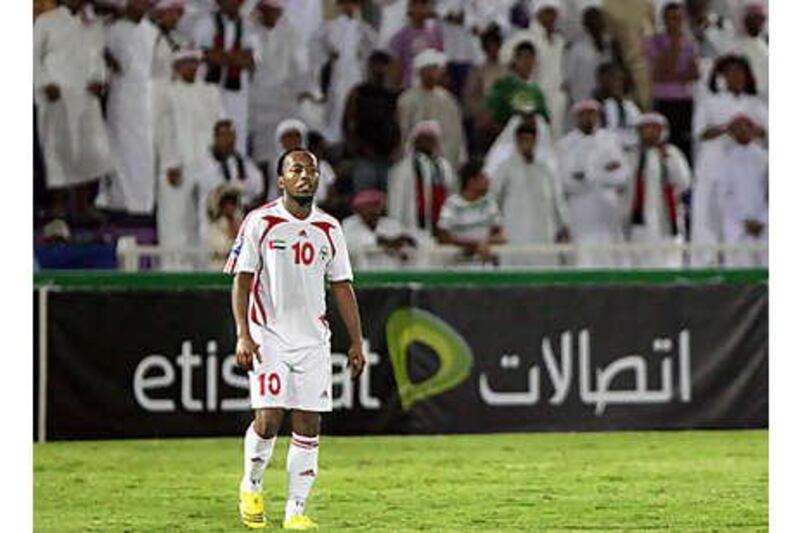 Ismail Matar, the UAE striker, looks dejected after another defeat in the final Asian qualifying stage for the 2010 World Cup. The national team lost seven of their eight games and finished bottom of the five-team group.