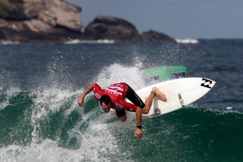 Joel Parkinson of Australia (who is sponsored by Billabong) surfs during the final of the men's Association of Surfing Professionals (ASP) Billabong Rio Pro championship at Barra da Tijuca beach in Rio de Janeiro May 16, 2012. REUTERS/Sergio Moraes (BRAZIL - Tags: SPORT) - RTR325JD