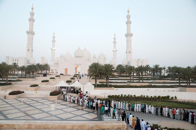 Abu Dhabi, United Arab Emirates, July 17, 2015:    People wait to take part in the first prayers of Eid Al Fitr at the Sheikh Zayed Grand Mosque in Abu Dhabi on July 17, 2015. Christopher Pike / The National