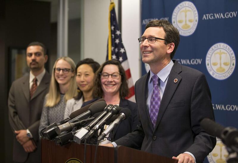 Washington state attorney general Bob Ferguson smiles during a press conference at his office on February 9, 2017 in Seattle, Washington, after an appeals court refused to reinstate US president Donald Trump’ss ban on travellers from seven predominantly Muslim nations. Stephen Brashear / Getty Images / AFP