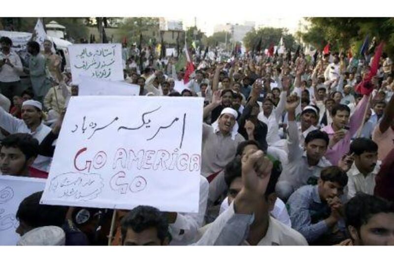 Pakistani protesters demonstrate outside the US consulate in Lahore after the US accused the country's most powerful intelligence agency of supporting extremist attacks against American targets in Afghanistan. K.M. Chaudary / AP Photo