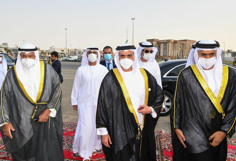 Sheikh Saif bin Zayed, UAE Deputy Prime Minister and Minister of the Interior, centre, arrives for the funeral of Kuwait's late ruler Sheikh Sabah at the Bilal bin Rabah Mosque in Kuwait City. AFP