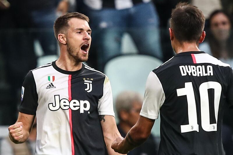 Juventus midfielder Aaron Ramsey celebrates after scoring an equalizer. AFP