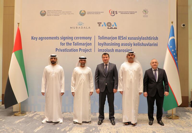 UAE Minister of Energy and Infrastructure Suhail Al Mazrouei, second from left, witnessed the signing of the agreements between Mubadala, Taqa and Uzbekistan. Photo: Taqa