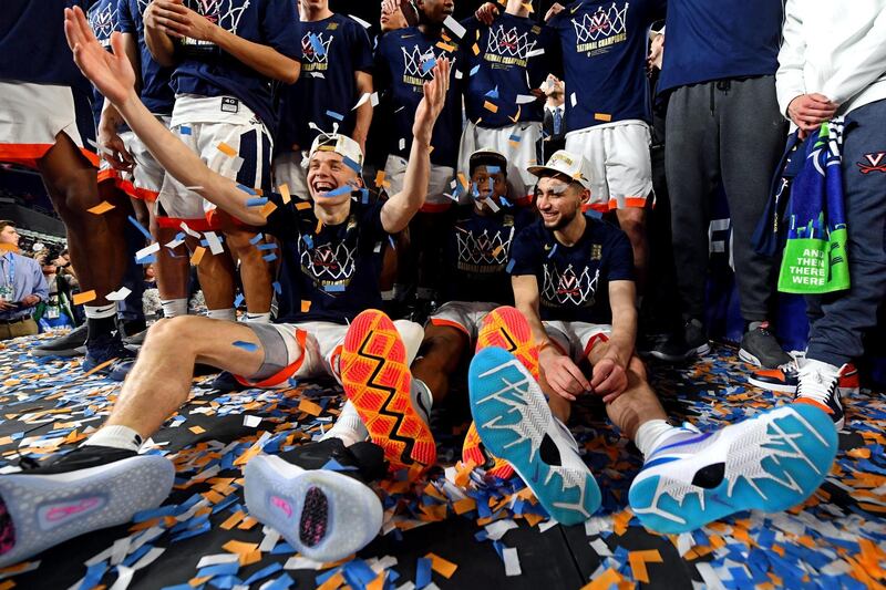 Virginia Cavaliers celebrate after beating the Texas Tech Red Raiders in the championship game of the 2019 Final Four basketball in Minneapolis. Reuters