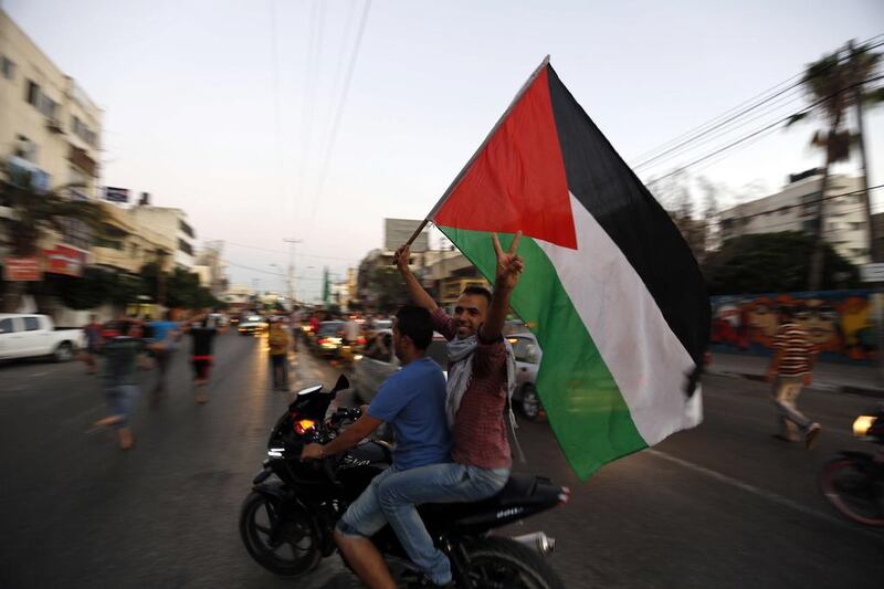 As night fell, there was no letup in the celebrations as the rhythmic thud of drums beat a celebratory pulse. Mohammed Abed/ AFP Photo