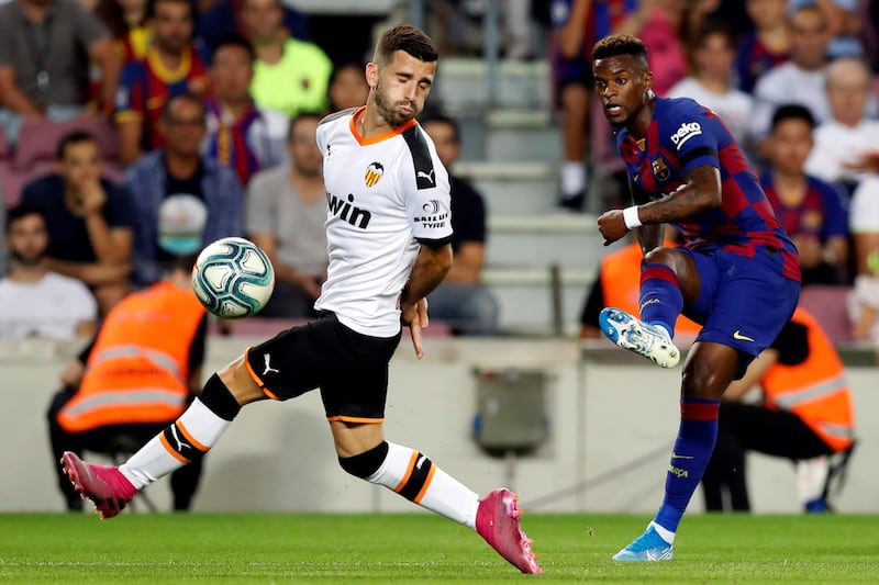 Barcelona's Nelson Semedo in action against Valencia's Jose Gaya. EPA