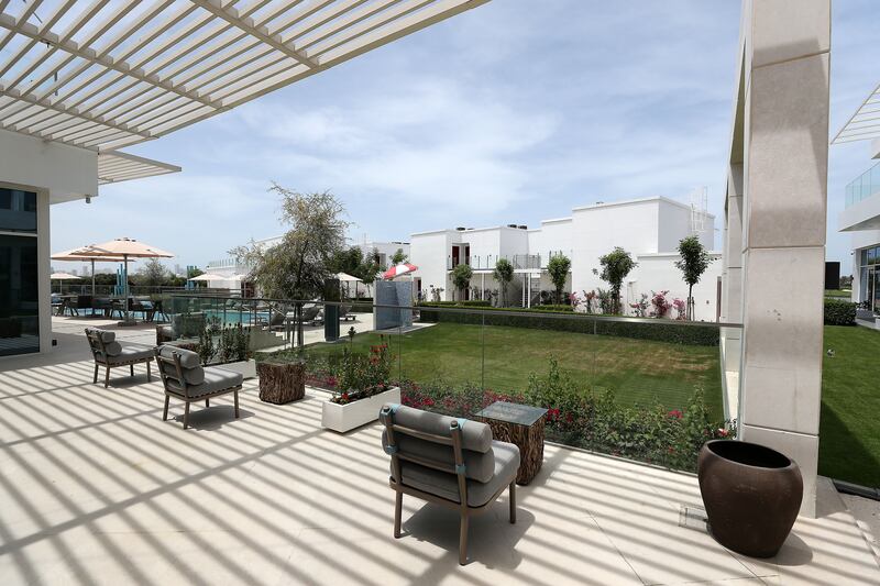 Outdoor seating allows guests to take in the fresh air in this pristine part of Ajman.