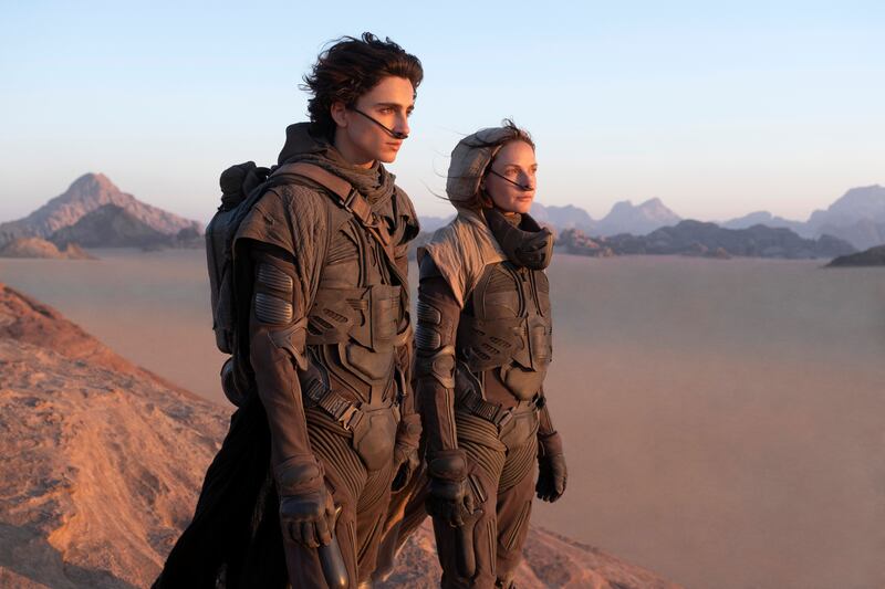 Timothee Chalamet, left, and Rebecca Ferguson in a scene from 'Dune', which was partly shot in Abu Dhabi, and has 10 nods including in Best Picture, Cinematography and Adapted Screenplay. Warner Bros Pictures via AP