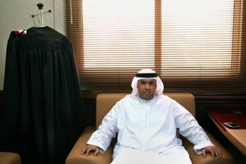 United Arab Emirates -Dubai- Aug. 30, 2009:

NATIONAL: Criminal court chief justice judge Ahmed Ibrahim Saif (cq-al), 37, of Dubai, conducts business and poses for his portrait at his office in the Dubai Courts in Dubai on Sunday, Aug. 30, 2009. "Sometimes when you have a case, all the night, you are not sleeping," said Saif who heads the court's deportation committee. "You'll be thinking about this case at home. If you are sleeping, you think about this case. If you are eating, you think about this case. We are Muslim. We believe in God. If I make something wrong, my God will ask me. So I must be sure." Amy Leang/The National
 *** Local Caption ***  amy_083009_judgesaif_02.jpg