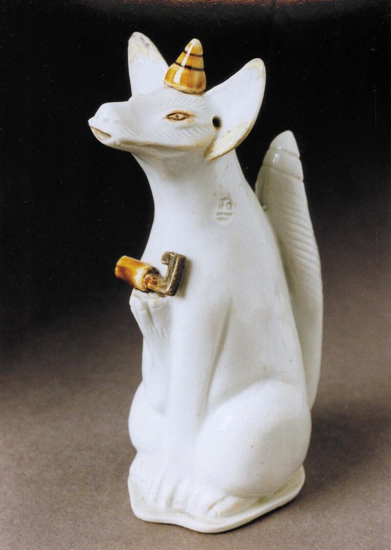 Fox shrine figure 
Mikawachi, Japan, 1826–75 
The fox is a spirit messenger for Inari, the important Shinto deity for rice, harvests, trade and prosperity. 
© the Trustees of the British Museum