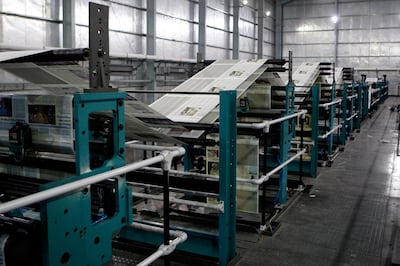 ABU DHABI, UNITED ARAB EMIRATES - April 9, 2008: The National Newspaper's new printing press, produces the first prototype newspaper. ( Ryan Carter / The National ) *** Local Caption *** RC006-PrintingPress.jpg