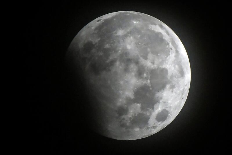 The full moon is pictured during a partial lunar eclipse in Kathmandu. AFP