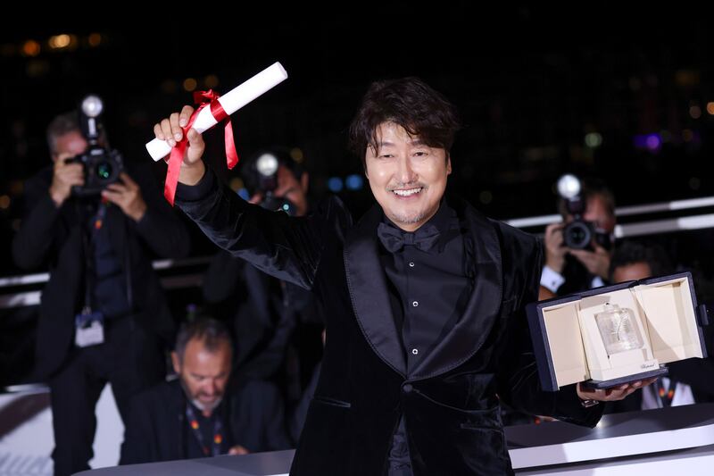 Song Kang-ho, winner of the Best Actor award for 'Broker,' at the photocall following the awards ceremony. AP