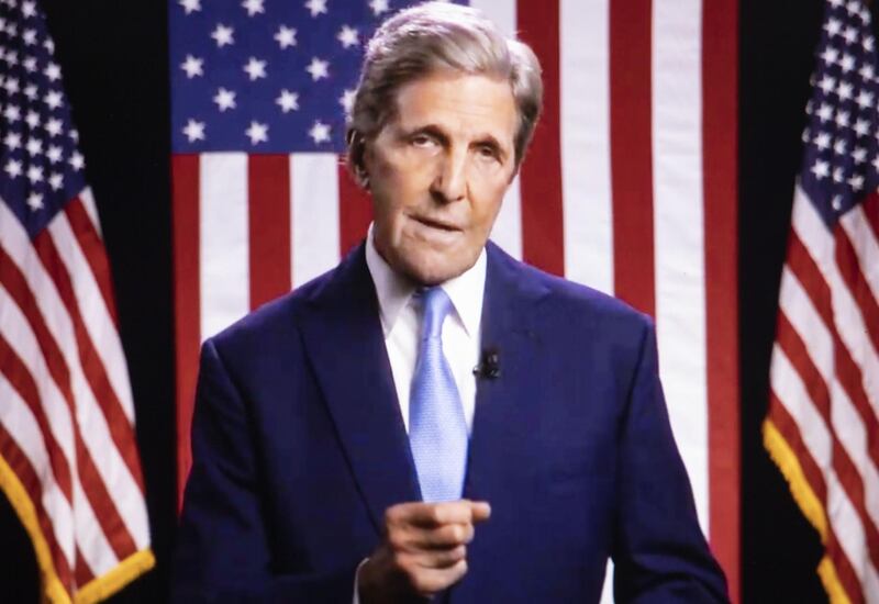 Former U.S. Secretary of State John Kerry speaks during the virtual Democratic National Convention seen on a laptop computer in Tiskilwa, Illinois, U.S. Bloomberg