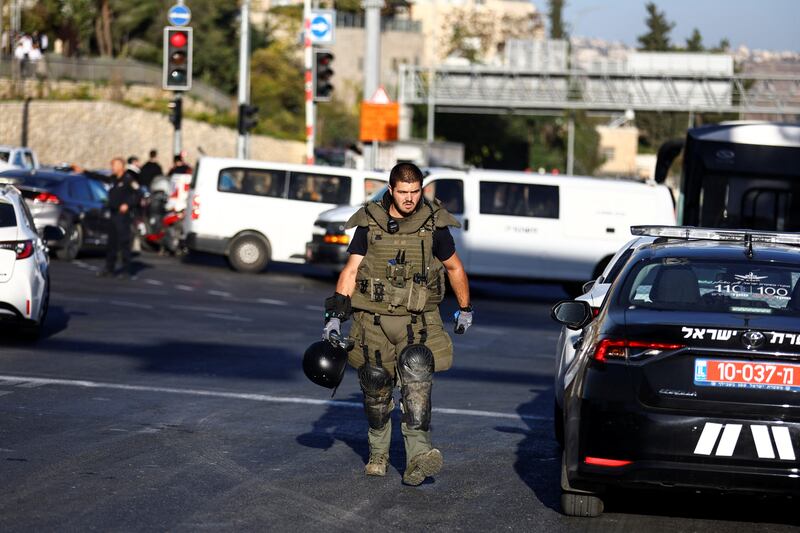 An Israeli military engineer examines the scene. Paramedic crews say they attended to at least a dozen injured. Reuters