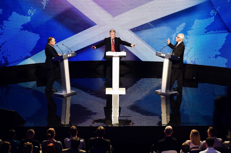 Alex Salmond, then first minister of Scotland, and Mr Darling, then chairman of Better Together take part in a live television debate in Glasgow, in 2014. They were trying to influence voters before the referendum on whether Scotland should be an independent country