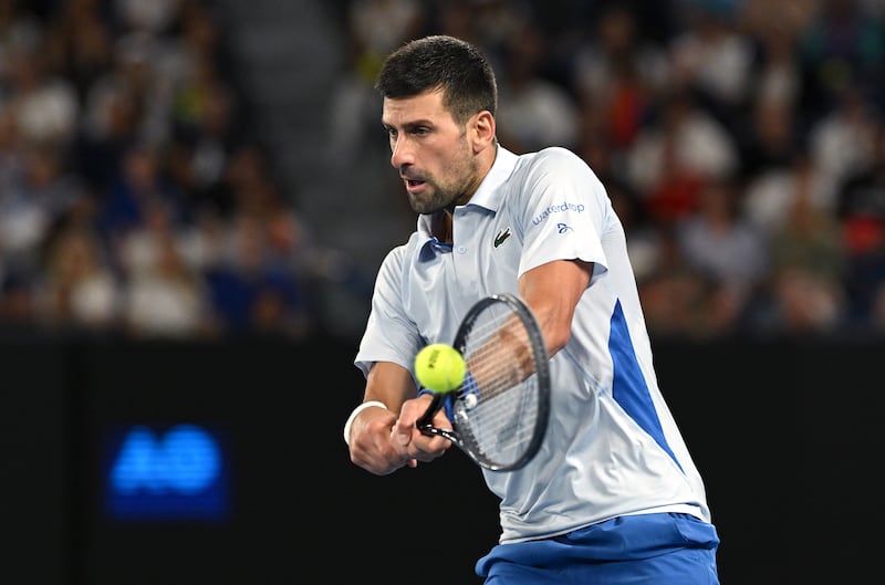 Novak Djokovic hits a return during his fourth-round match against Adrian Mannarino. EPA