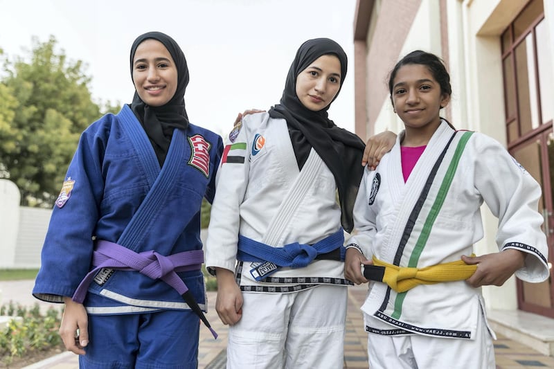 AL AIN, UNITED ARAB EMIRATES. 07 JANUARY 2018. The three Al Hanaei sisters who compete in Jiu Jitsu. LtoR: Maha Saleh Alhinaai (18), Mahra Saleh Alhinaai (16) and Hana Saleh Alhinaai (14) at the Al Hajer School in Al Ain. (Photo: Antonie Robertson/The National) Journalist: Amith Passela. Section: Sport.