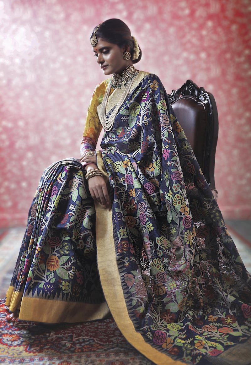 Gaurang Shah is known for his regal-looking saris, paired here with pearl jewellery from Kishandas & Co. Courtesy Numaish 