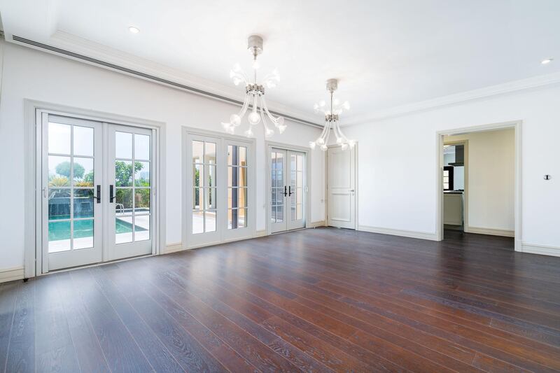 Dark wooden floors add to the European feel.