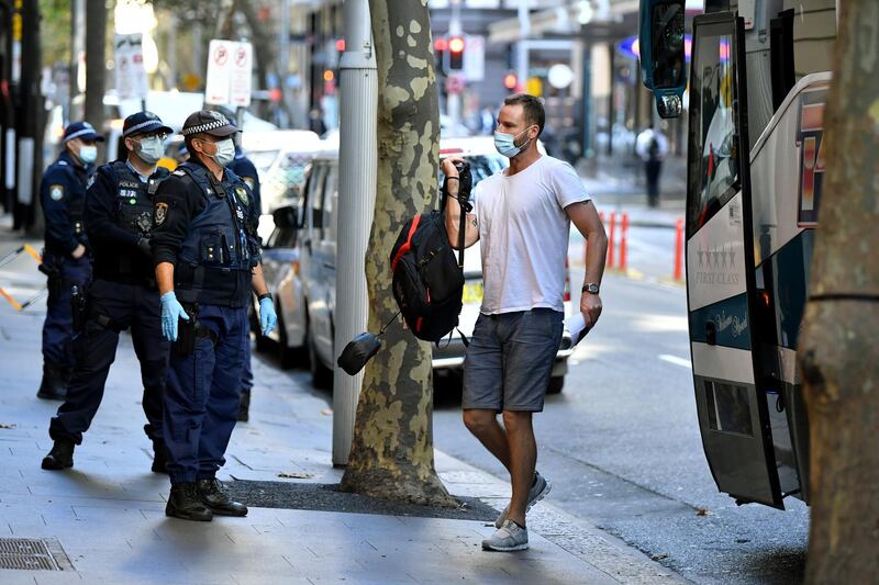 Australian coach Adam Griffith arrives for hotel quarantine in Sydney. Reuters