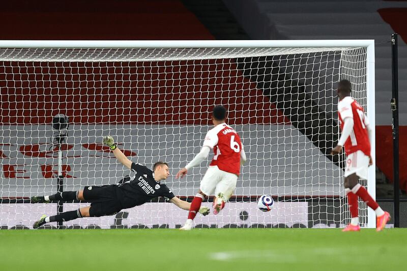 Bernd Leno of Arsenal attempts to save a free kick from Harry Kane of Tottenham Hotspur that hits the post. Getty