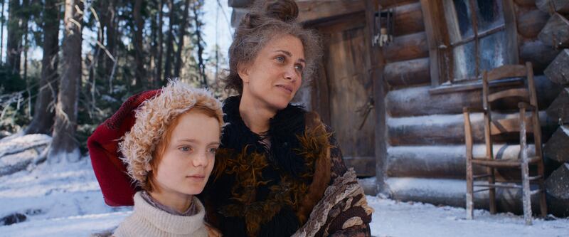 Henry Lawfull as Nikolas and Kristen Wiig as Aunt Carlotta in 'A Boy Called Christmas'. Photo: Netflix