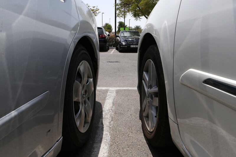 DUBAI , UNITED ARAB EMIRATES – Sept 9 , 2016 : People parked their cars close to each other in the parking area of Ibn Battuta mall in Dubai. ( Pawan Singh / The National ) For News. ID No - 62241
 *** Local Caption ***  PS0909- BAD PARKING09.jpg