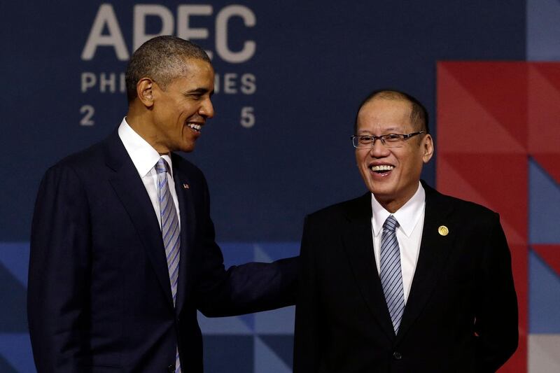 Philippine president Benigno Aquino greets US president Barack Obama as he arrives for the Asia-Pacific Economic Co-operation leaders' meeting in Manila on November 19, 2015. AFP
