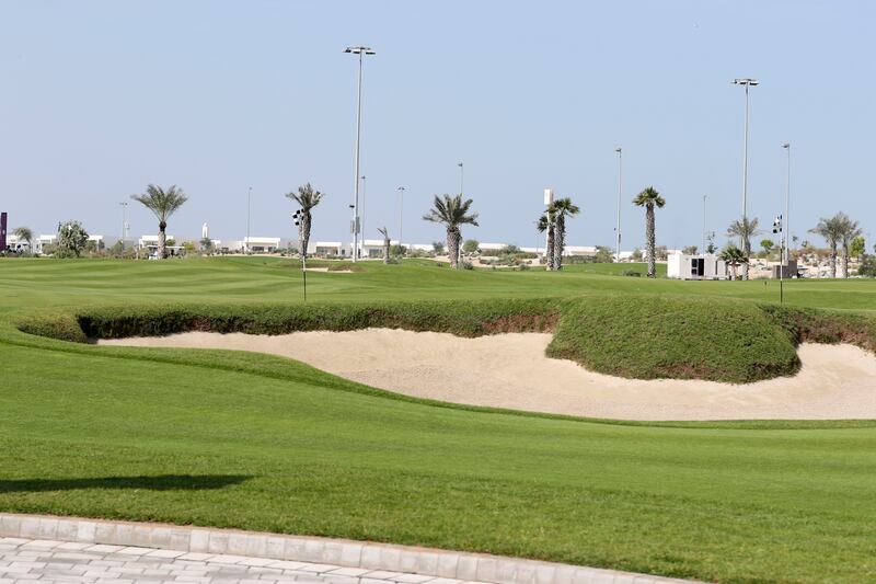 A lake and stream system flows through the entire course, supporting native desert plants and vegetation.