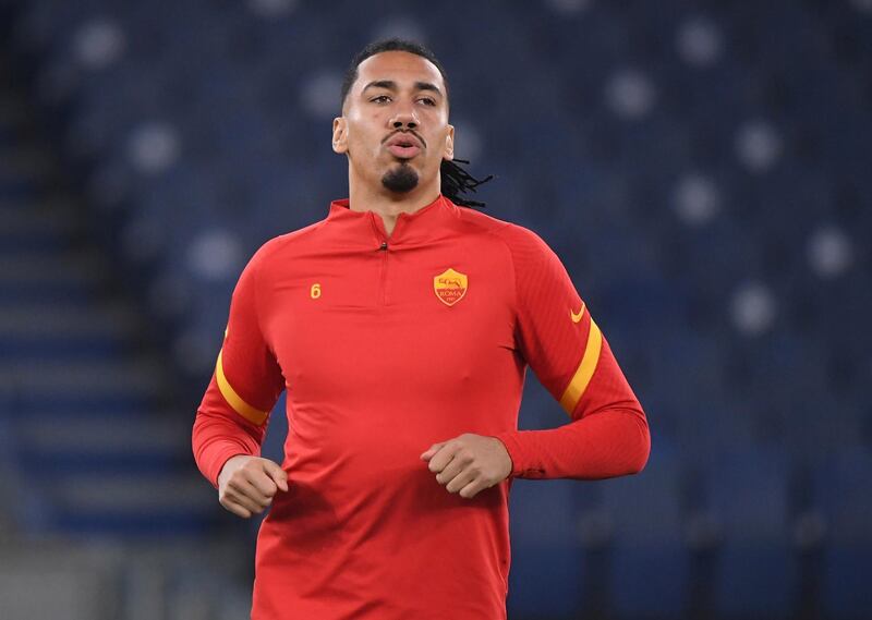 FILE PHOTO: Soccer Football - Serie A - Lazio v AS Roma - Stadio Olimpico, Rome, Italy - January 15, 2021 AS Roma's Chris Smalling during the warm up before the match REUTERS/Alberto Lingria/File Photo