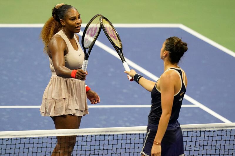 Serena Williams taps rackets with Margarita Gasparyan after their US Open second round match. PA