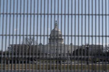 The US Capitol behind security fencing in Washington on March 4, 2021. The National 