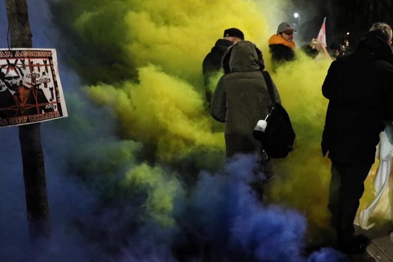 People gather in a protest in front of the embassy of the Russian Federation in Warsaw, Poland. EPA