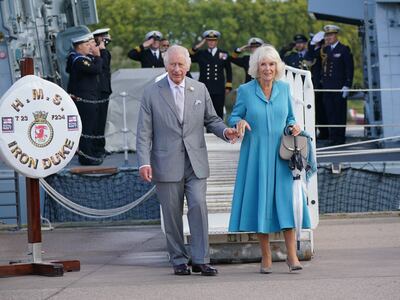 King Charles III and Queen Camilla leave after attending a reception on the flight deck of HMS Iron Duke in Bordeaux. PA 