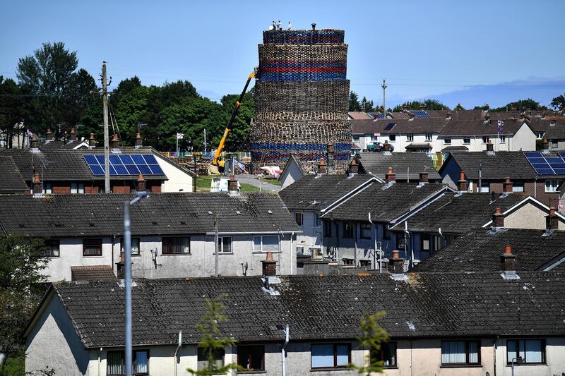 Locals from the Craigyhill area of Larne, Northern Ireland, building an Eleventh Night bonfire ahead of the July 12 Battle of the Boyne celebrations held by members of the Protestant Orange Order. Reuters