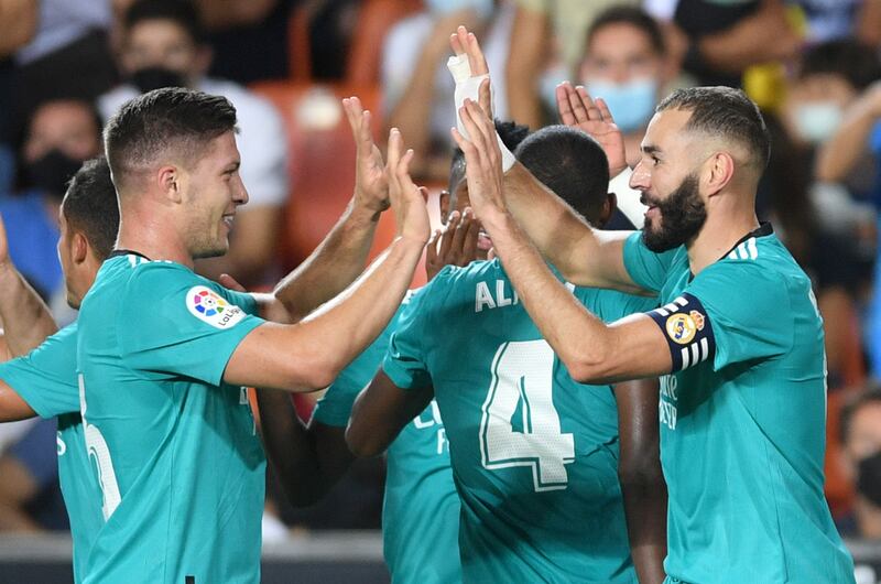 Karim Benzema celebrates with Luka Jovic after scoring Real Madrid's second goal against Valencia. Getty Images