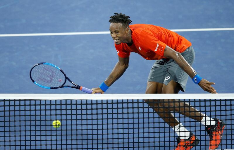 Monfils goes for a shot at the net. EPA