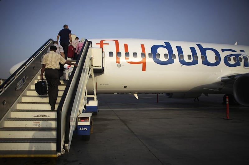 Flydubai will not return its grounded Boeing 737 Maxs into service unless it receives approval from the UAE civil aviation regulator. Galen Clarke / The National