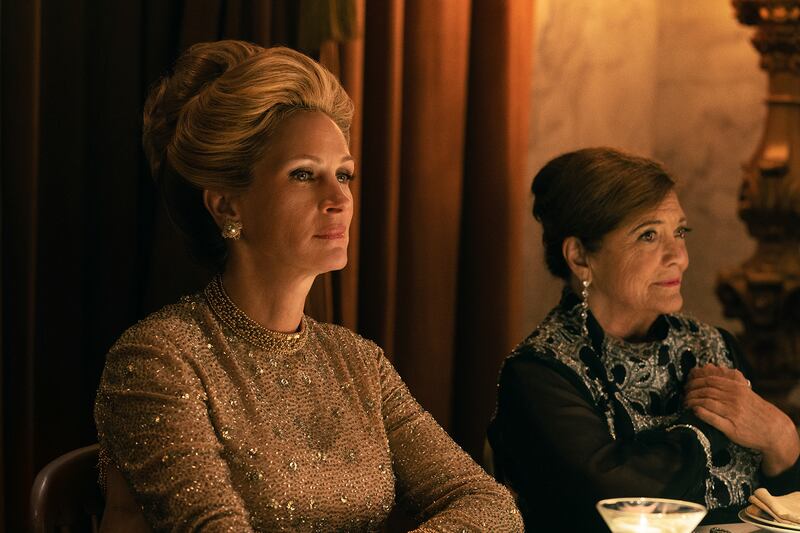 Julia Roberts as Martha Mitchell, left. 