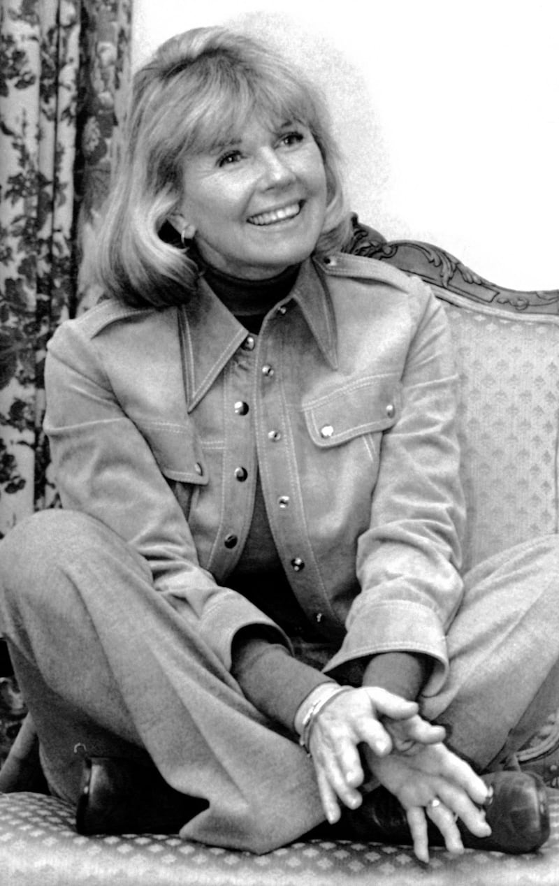 In this January 1976 file photo, actress and singer Doris Day answers questions in New York, during an interview on the book 'Doris Day: Her Own Story,' written by A.E. Hotchner. AP file