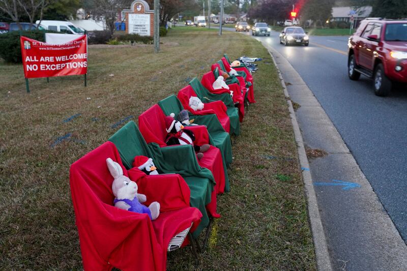 Chairs with stuffed animals sit outside St Thomas Episcopal Church representing the victims of the mass shooting. Reuters