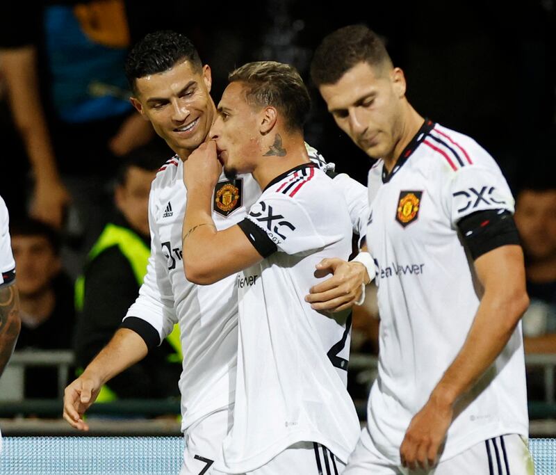 Cristiano Ronaldo celebrates scoring their second goal with Antony. Action Images