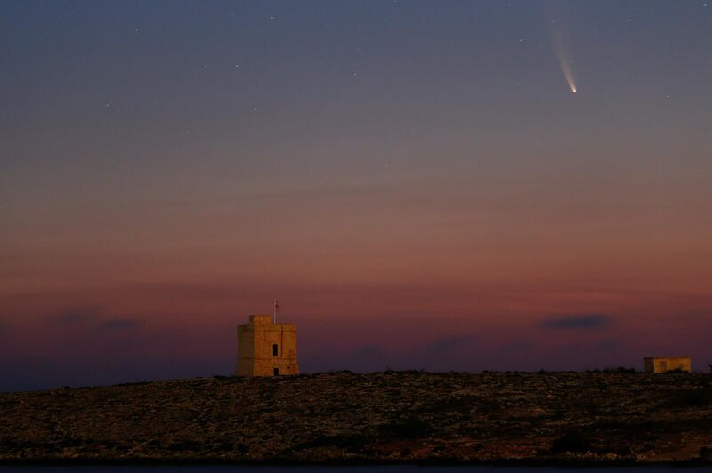The Comet C/2020 or "Neowise" is seen in the sky behind St Mark's Tower, a 17th century coastal fortification near the village of Bahar ic-Caghaq, Malta. Reuters