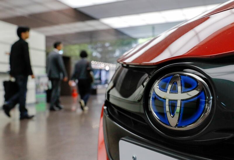 epa06924941 (FILE) - Office workers walk past Toyota Motor's plugin hybrid vehicle Prius PHV at Tokyo headquarters of Toyota Motor Corp. in Tokyo, Japan, 09 May 2017 (issued 03 August 2018). Toyota Motor Corp. announced on 03 August 2018 its financial results for the first quarter, which ended 30 June 2018. Consolidated vehicle sales for the first quarter totaled 2,236,131 units, an increase of 21,020 units compared to the same period last fiscal year. On a consolidated basis, net revenues for the period totaled 7.3627 trillion yen (around 65.924 billion US dollar), an increase of 4.5 percent. Operating income increased from 574.2 billion yen to 682.6 billion yen (around 5.14 billion to 6.11 billion US dollar), while income before income taxes was 813.8 billion yen (around 7.283 billion US dollar). Net income increased from 613.0 billion yen (around 5.486 billion US dollar) to 657.3 billion yen (around 5.883 billion US dollar. Operating income increased by 108.3 billion yen (around 969.3 million US dollar). Major factors contributing to the increase included a decrease in expenses of 60 billion yen (around 536.9 minnion US dollar) and an increase of 45 billion yen (around 402.7 million US dollar) in marketing activities.  EPA/KIMIMASA MAYAMA